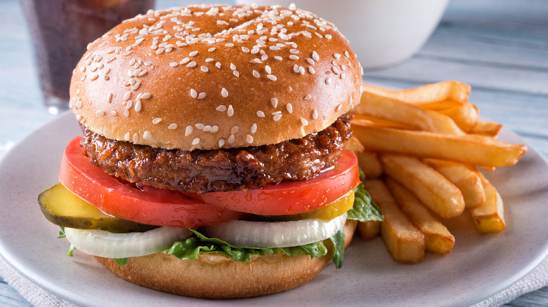 A hamburger and fries on a plate