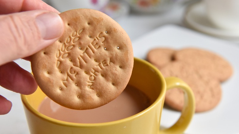 Dunking a biscuit in tea