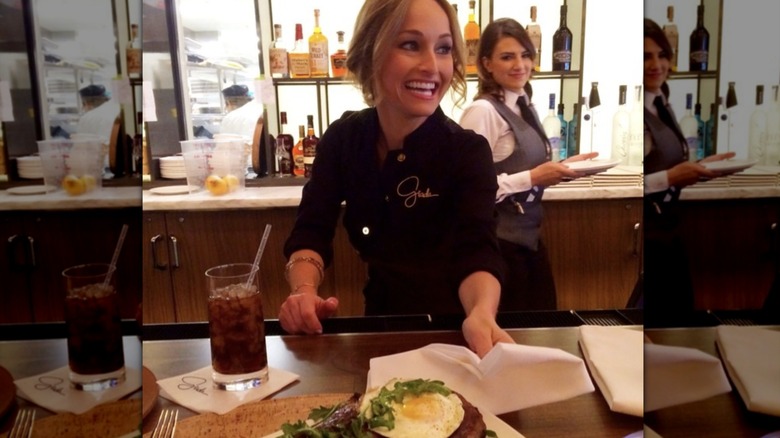 Giada De Laurentiis serving food at her restaurant