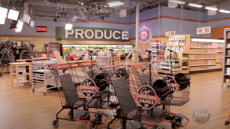 four grocery carts centered in Flavortown Market