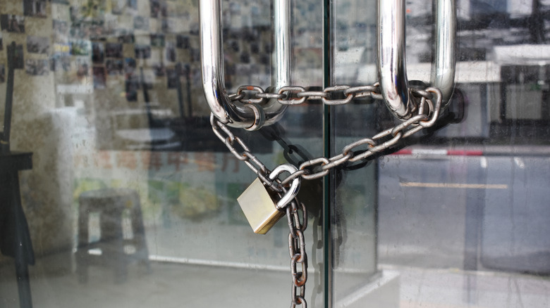 Glass doors with padlock and chain