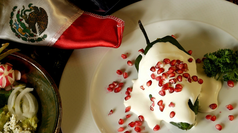 Chiles en nogada with the Mexican flag