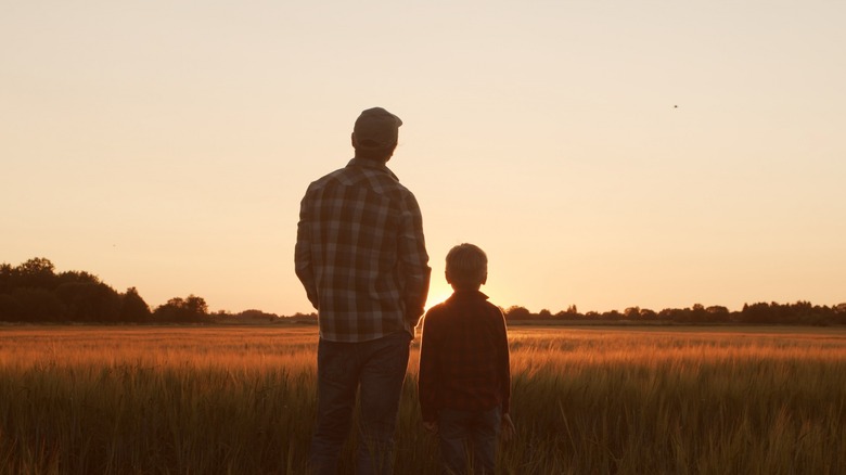 father and son on farm