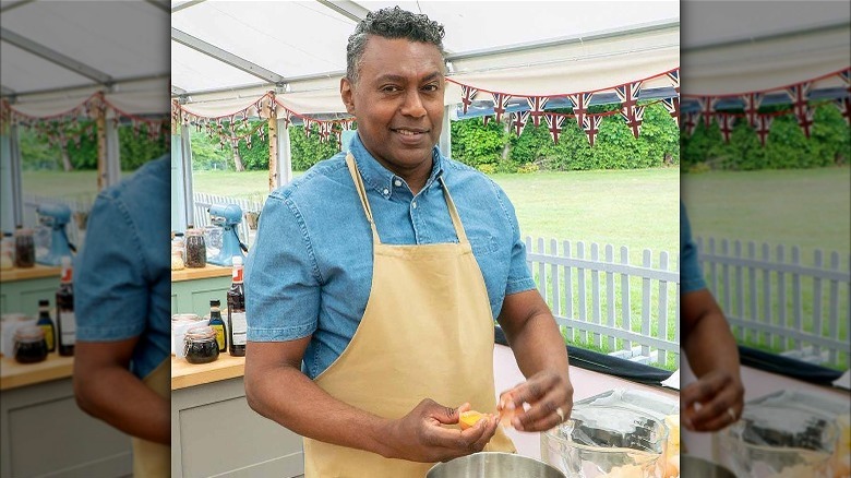 Jairzeno cracking eggs in GBBO tent