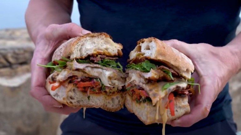 Gordon Ramsay holding Portuguese sandwich