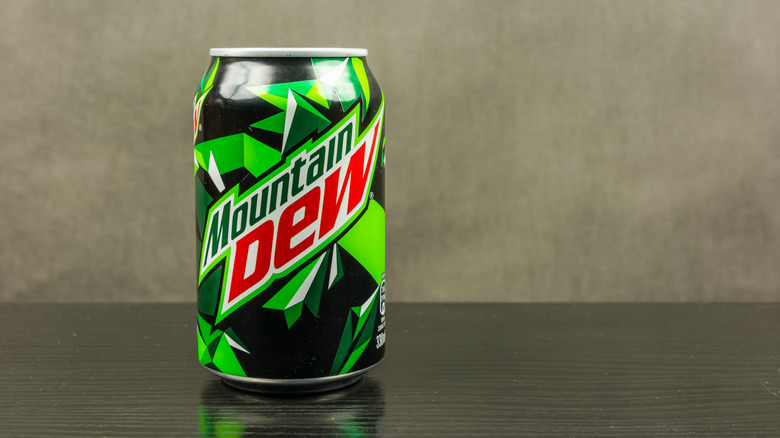 Mountain Dew can against gray backdrop