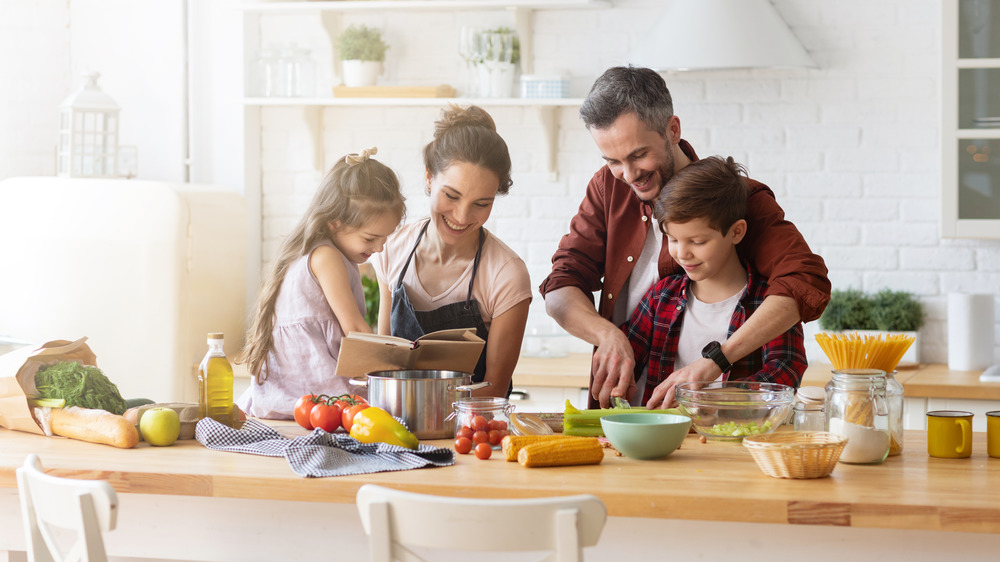 family cooking at home in the kitchen