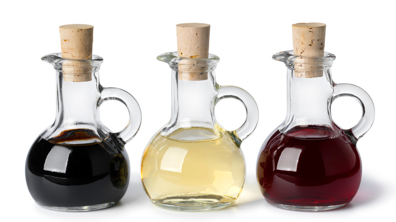 cruets of red, white, and balsamic vinegars