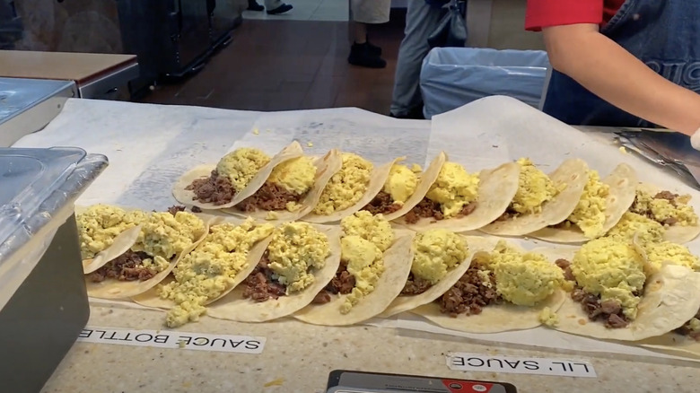 Breakfast tacos open on table