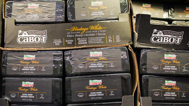 Boxes of Cabot cheddar stacked