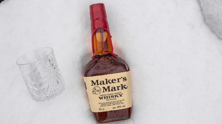 Maker's Mark  bottle with empty glass