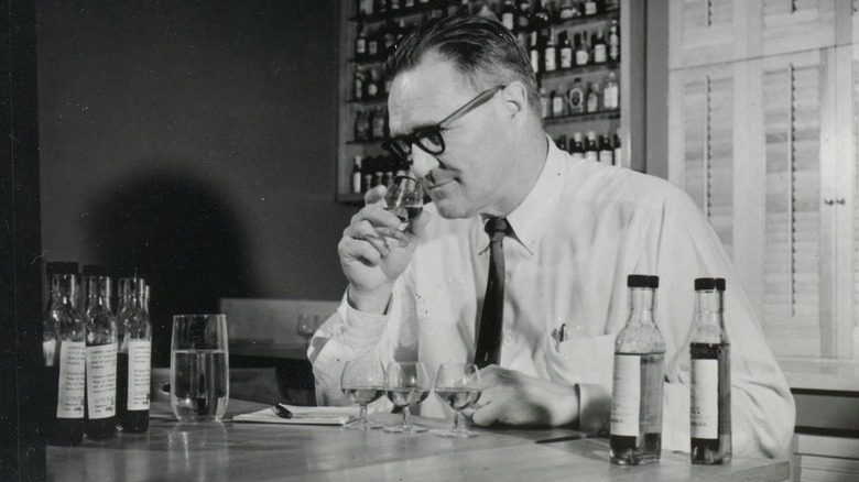 Bill Samuels Sr. sniffing a glass