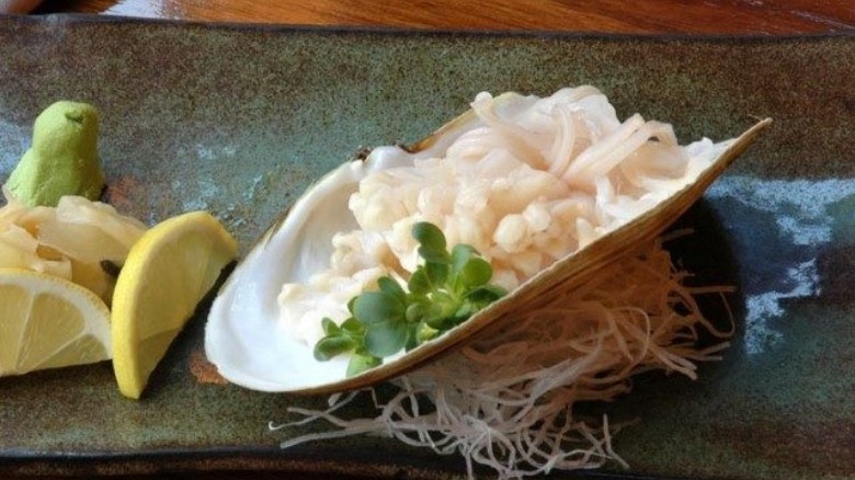 chopped geoduck on half shell