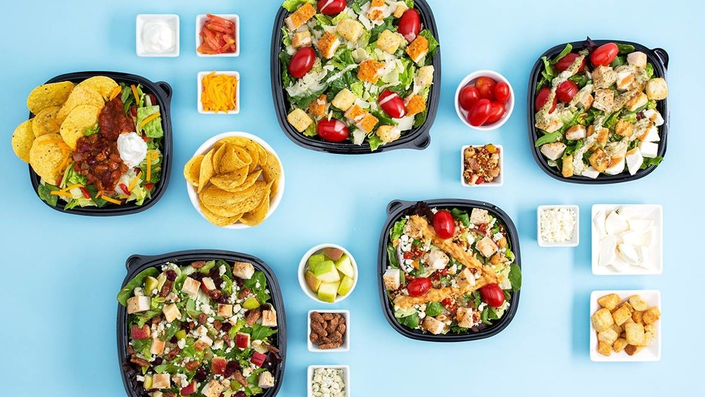 Wendy's salads on blue background