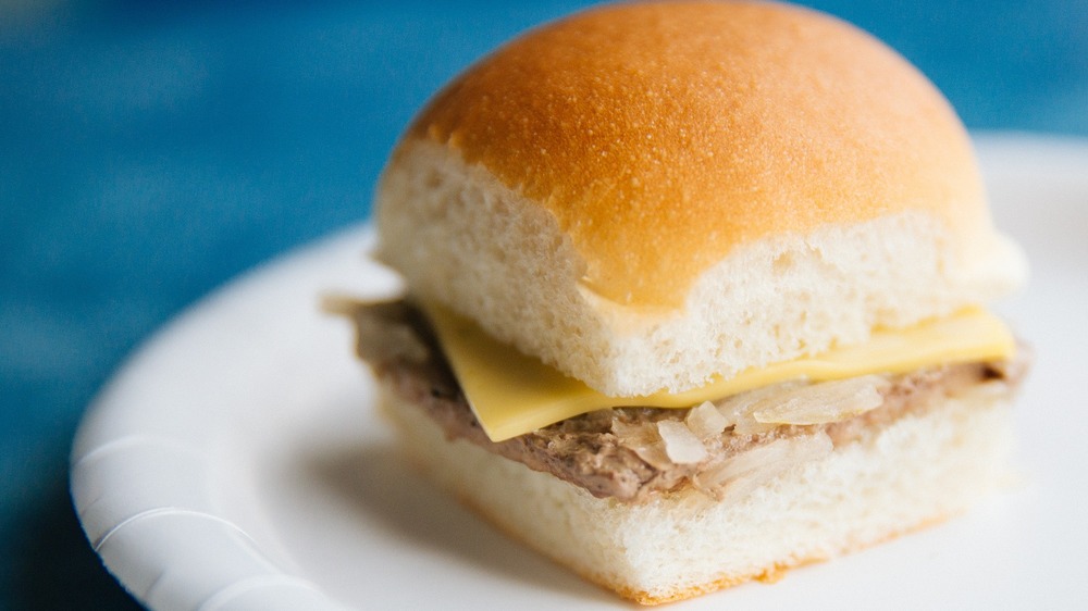 White Castle cheeseburger on blue background