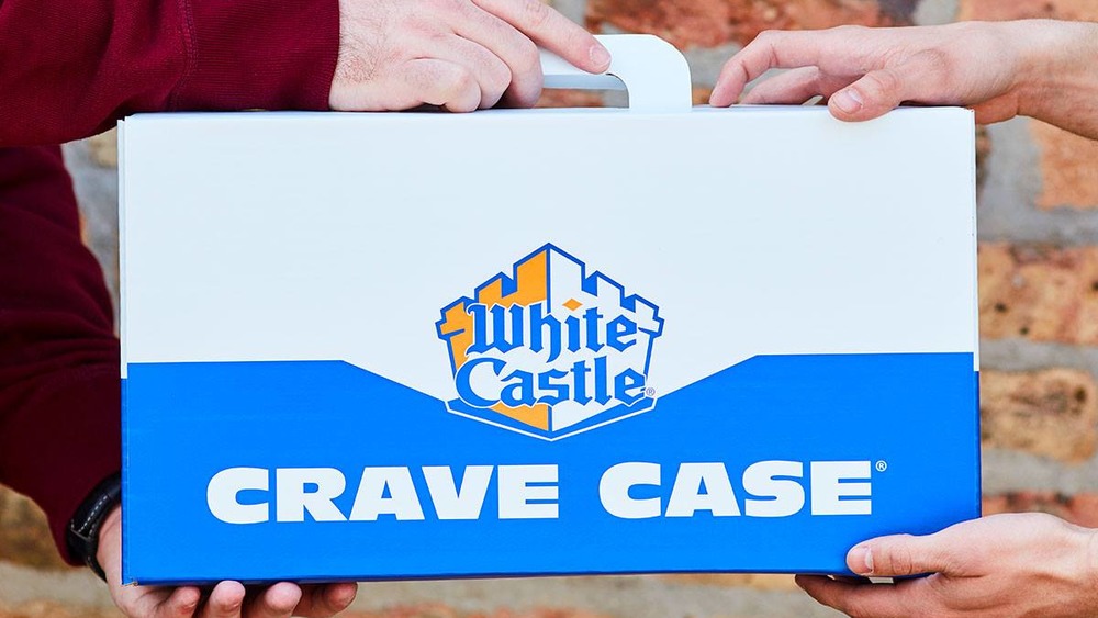 Man handing over box of White Castle burgers