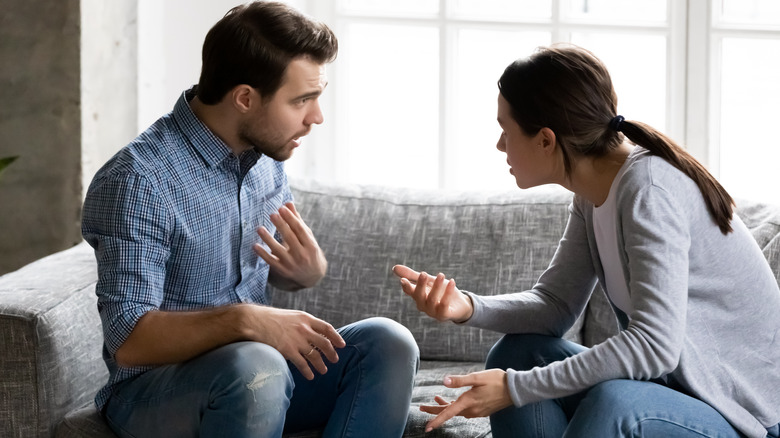 Two adults arguing