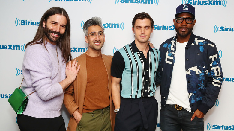 Queer Eye cast members standing side-by-side