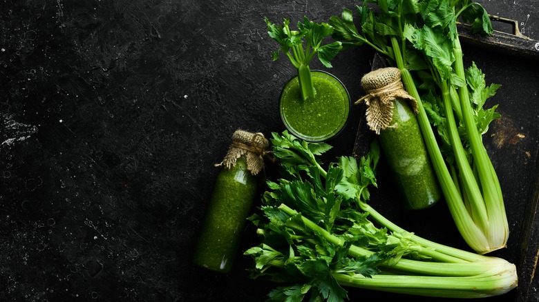 celery sticks and juice in jars