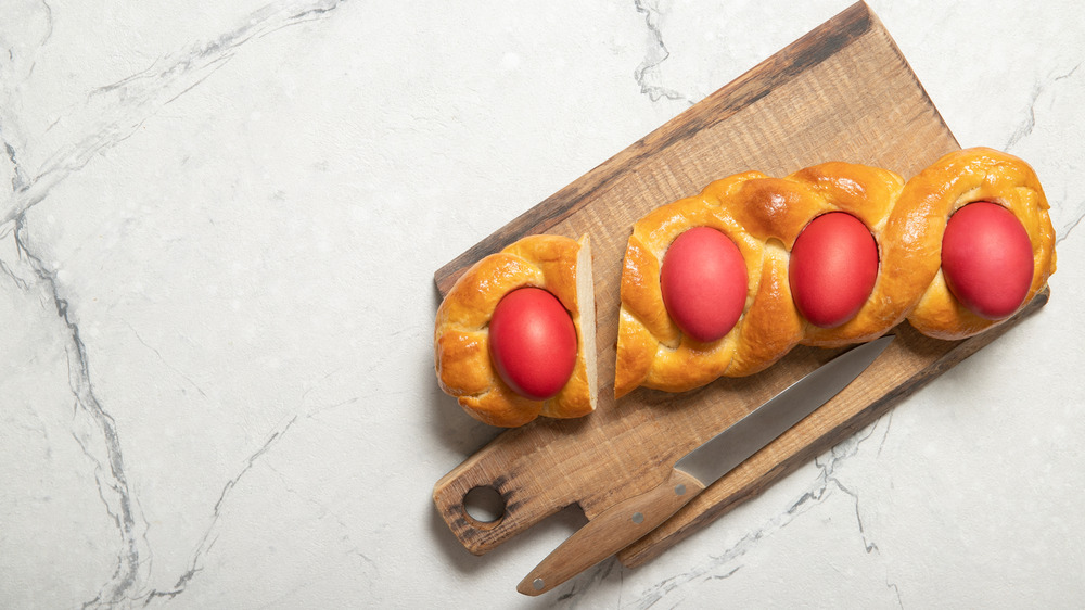 Braided egg bread with knife