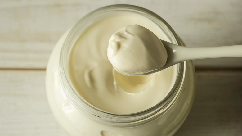 mayonnaise in a jar with spoon