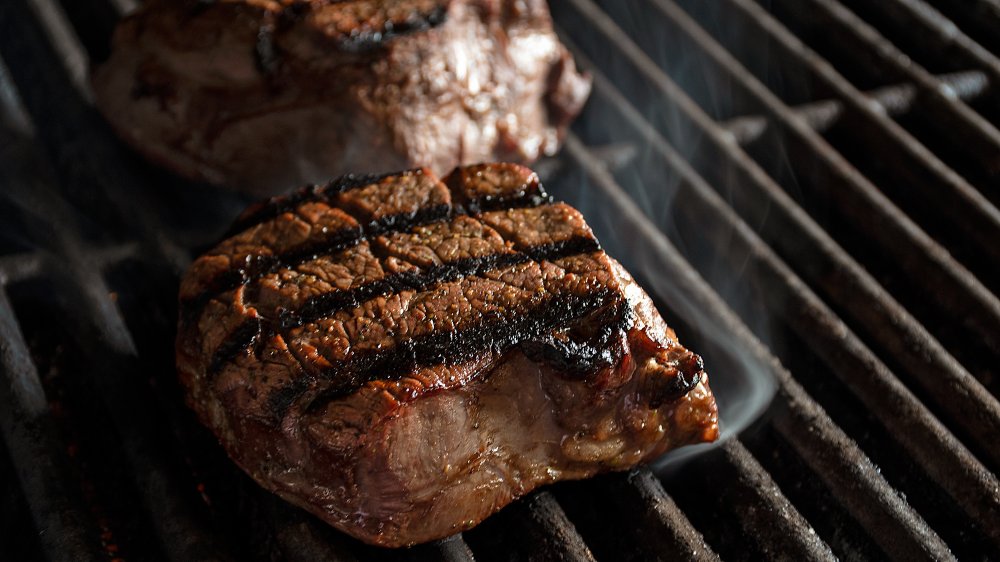 Lightwaves present meat cooked on an infrared grill