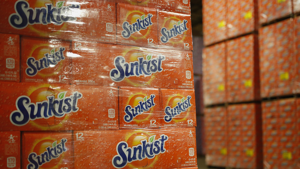 Boxes of Sunkist soda in a warehouse