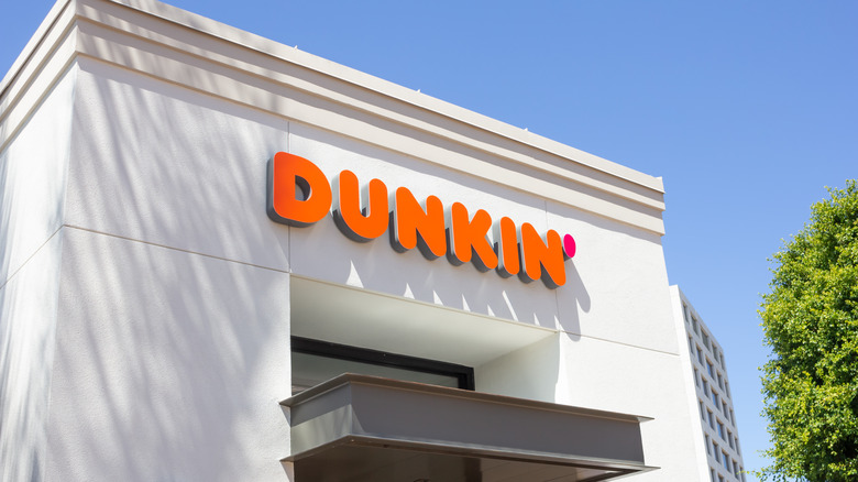 White building with Dunkin' logo