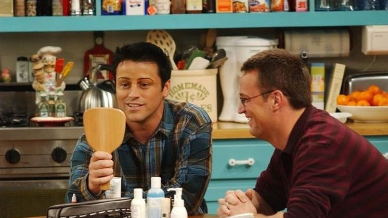 Joey and Chandler giving Joey new eyebrows