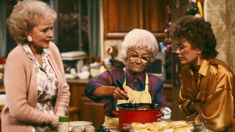 Rose, Sophia, and Blanche in the Golden Girls kitchen