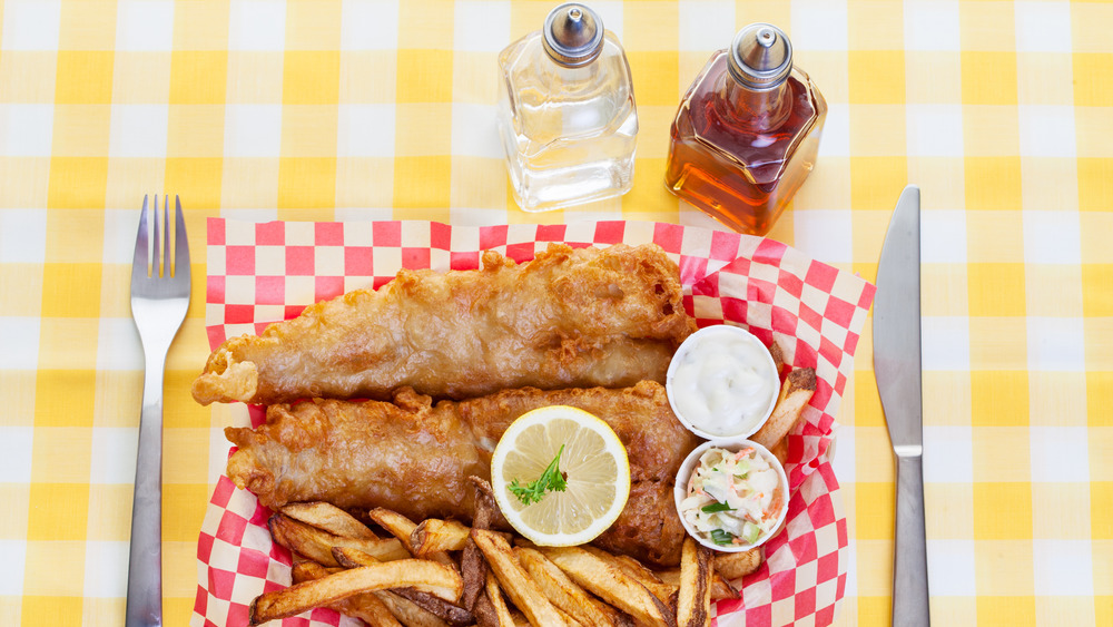 fish and chips served with vinegar