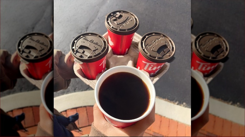 Four to-go coffees from Tim Hortons