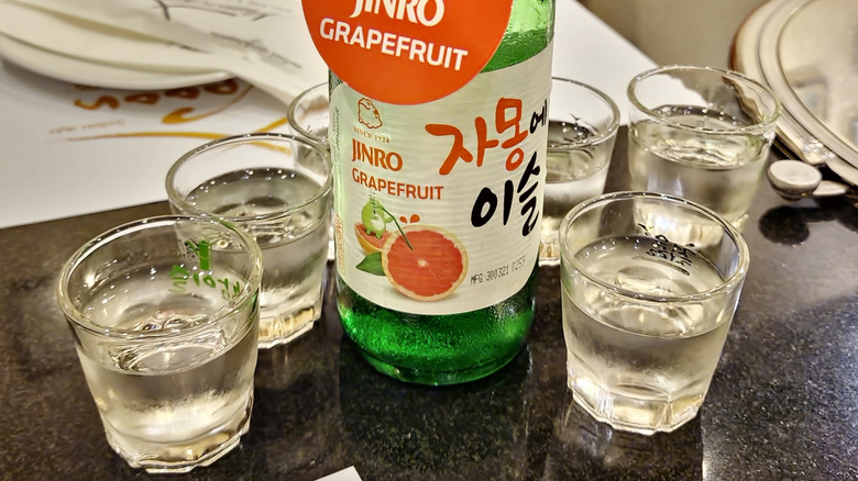 Grapefruit soju poured into shot glasses