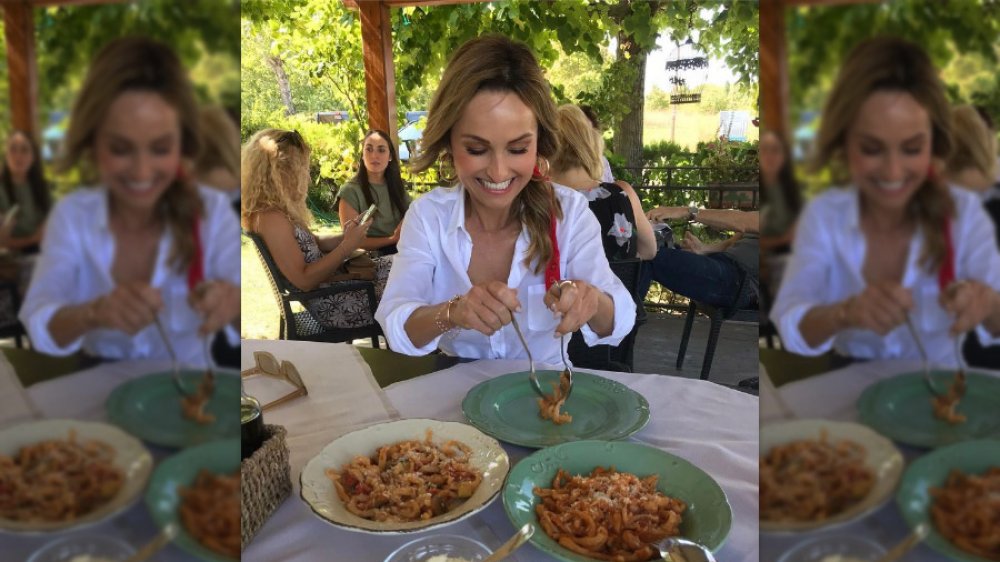 Giada De Laurentiis eating pasta