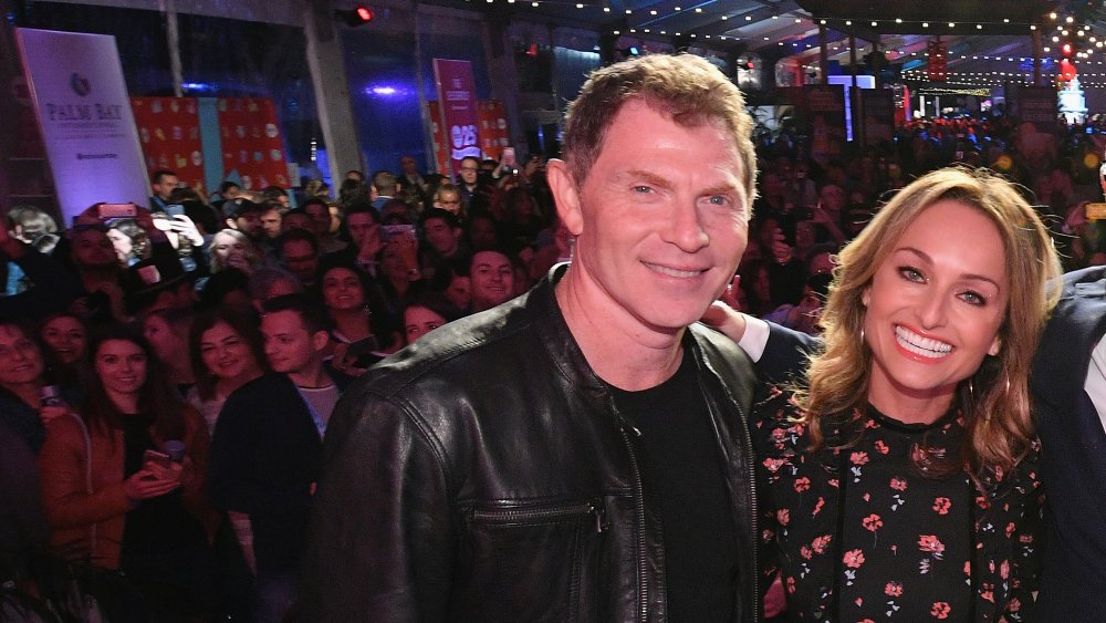 Bobby Flay and Giada De Laurentiis smiling