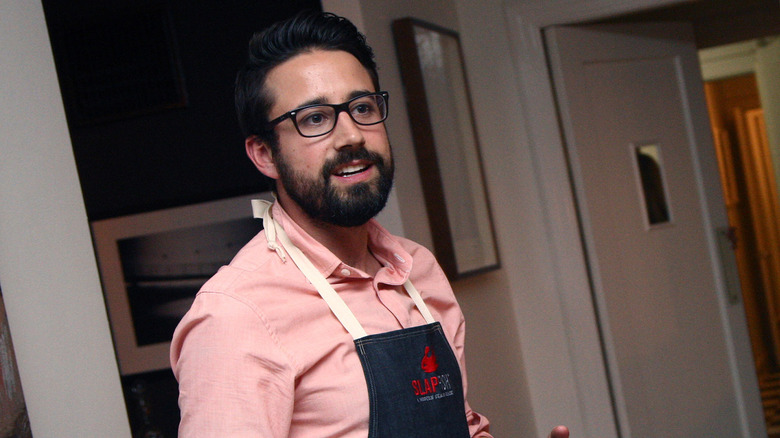 Andrew Gruel speaks during a dinner event