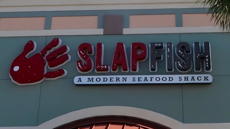 Storefront sign for Slapfish in Orlando