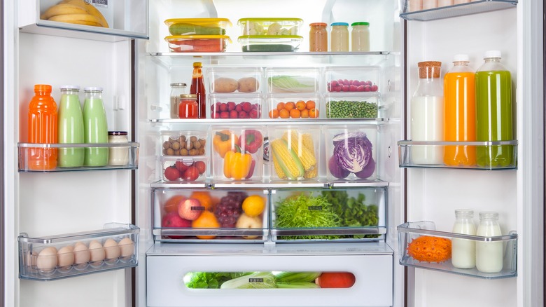 fruit and veg in open fridge