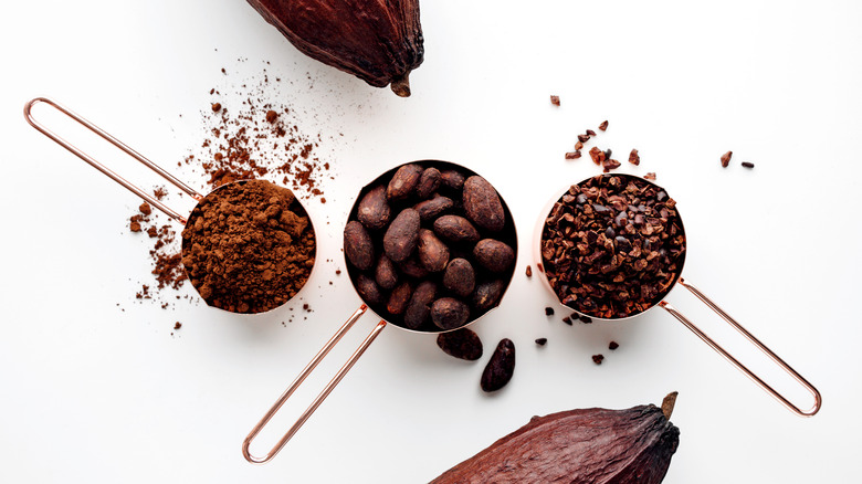 Measuring cups full of cacao