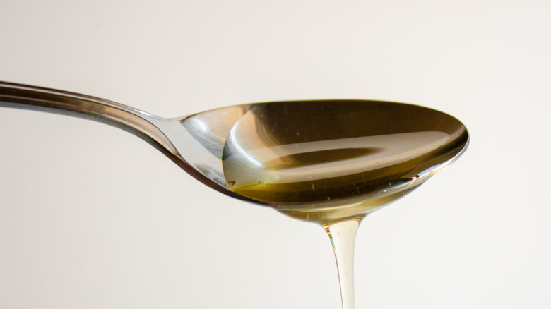 Agave nectar running off spoon