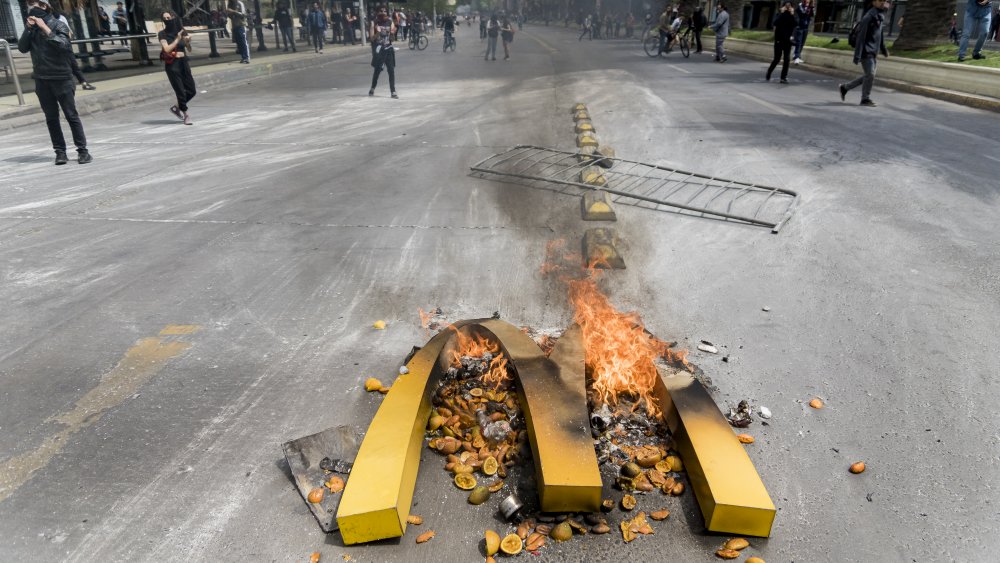 McDonald's sign burning during protest