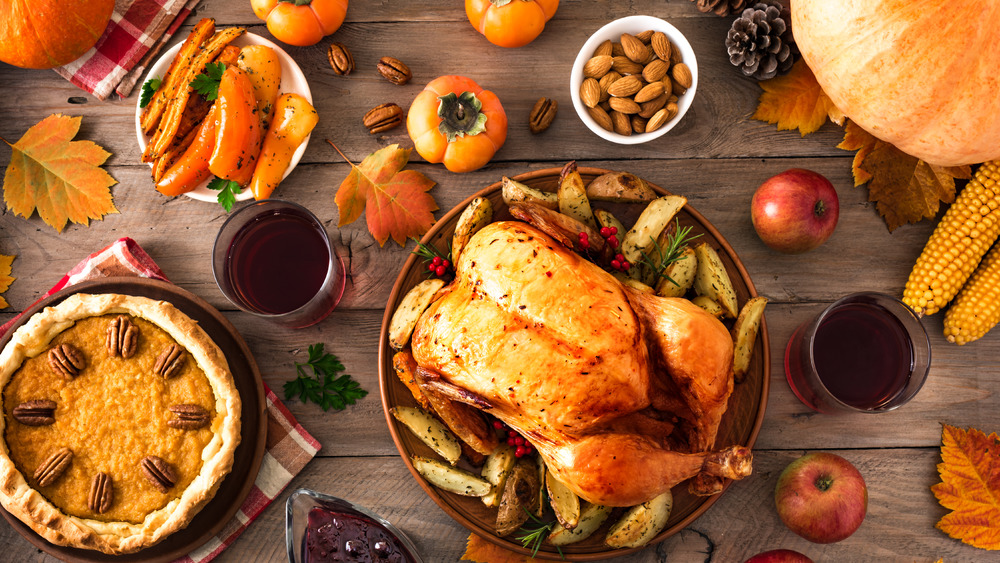 Thanksgiving table with turkey and sides