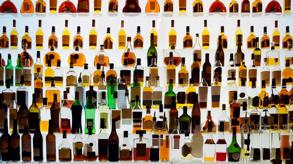 Alcohol bottles on a bar