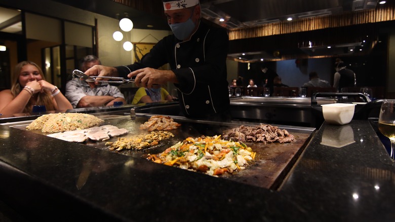 Teppanyaki chef cooking