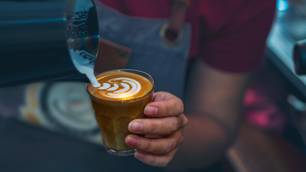 Person making latte art