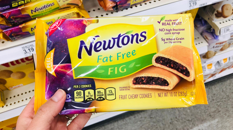 Holding package of Fat Free Newtons