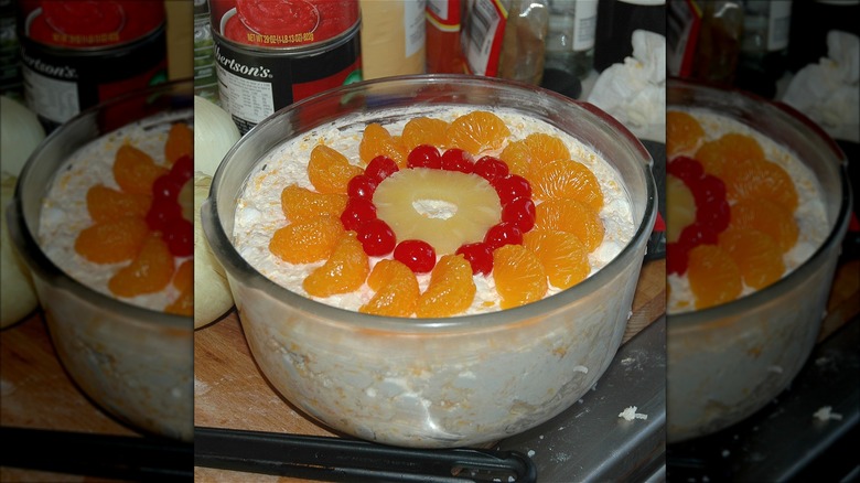 Old photo of ambrosia salad on cluttered counter