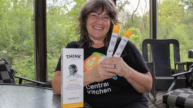 Gale Gand poses with Think jerky sticks