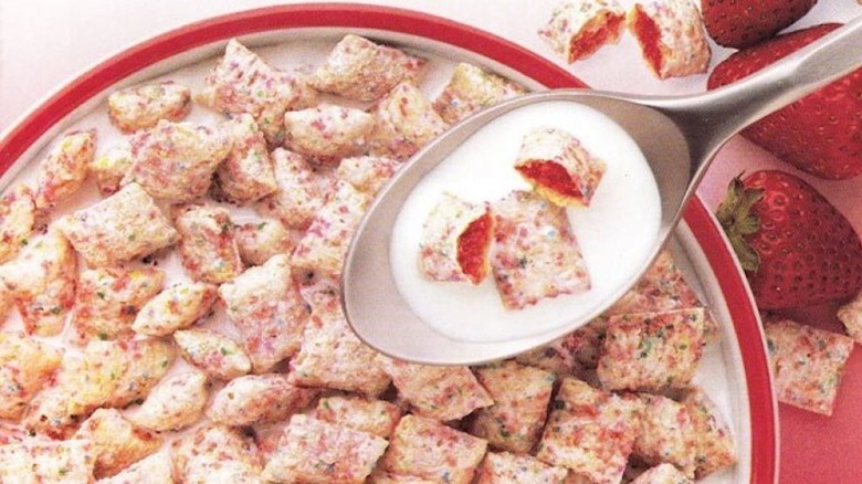 Red bowl of strawberry Pop-Tarts Crunch cereal with spoon