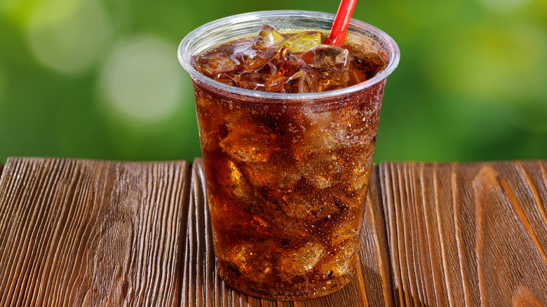 Soda in a clear plastic cup